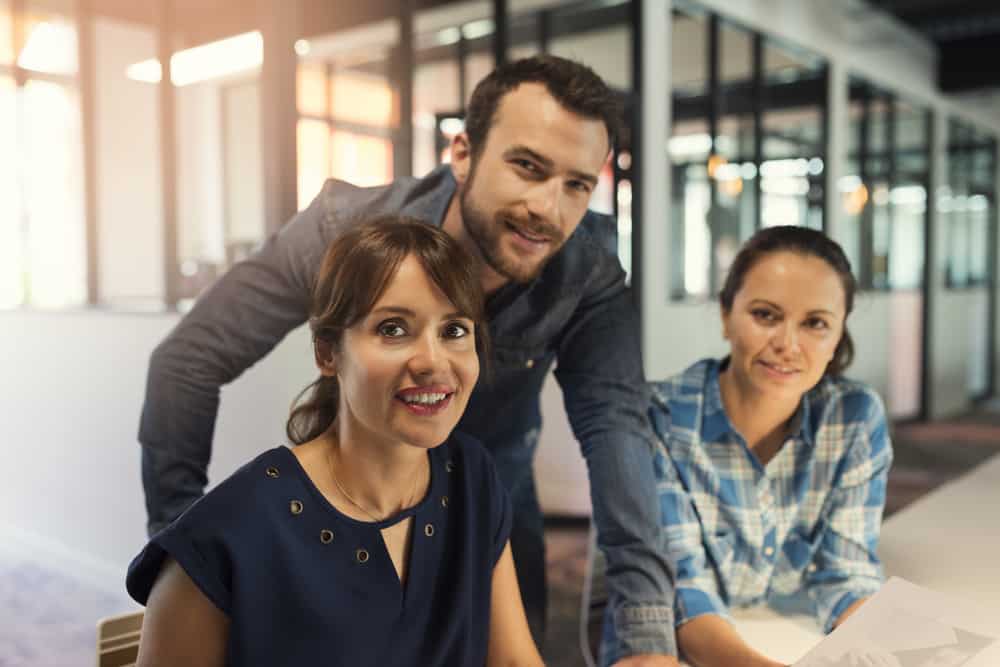 Portrait,Of,Business,Team,Working,Together,In,Modern,Open,Space
